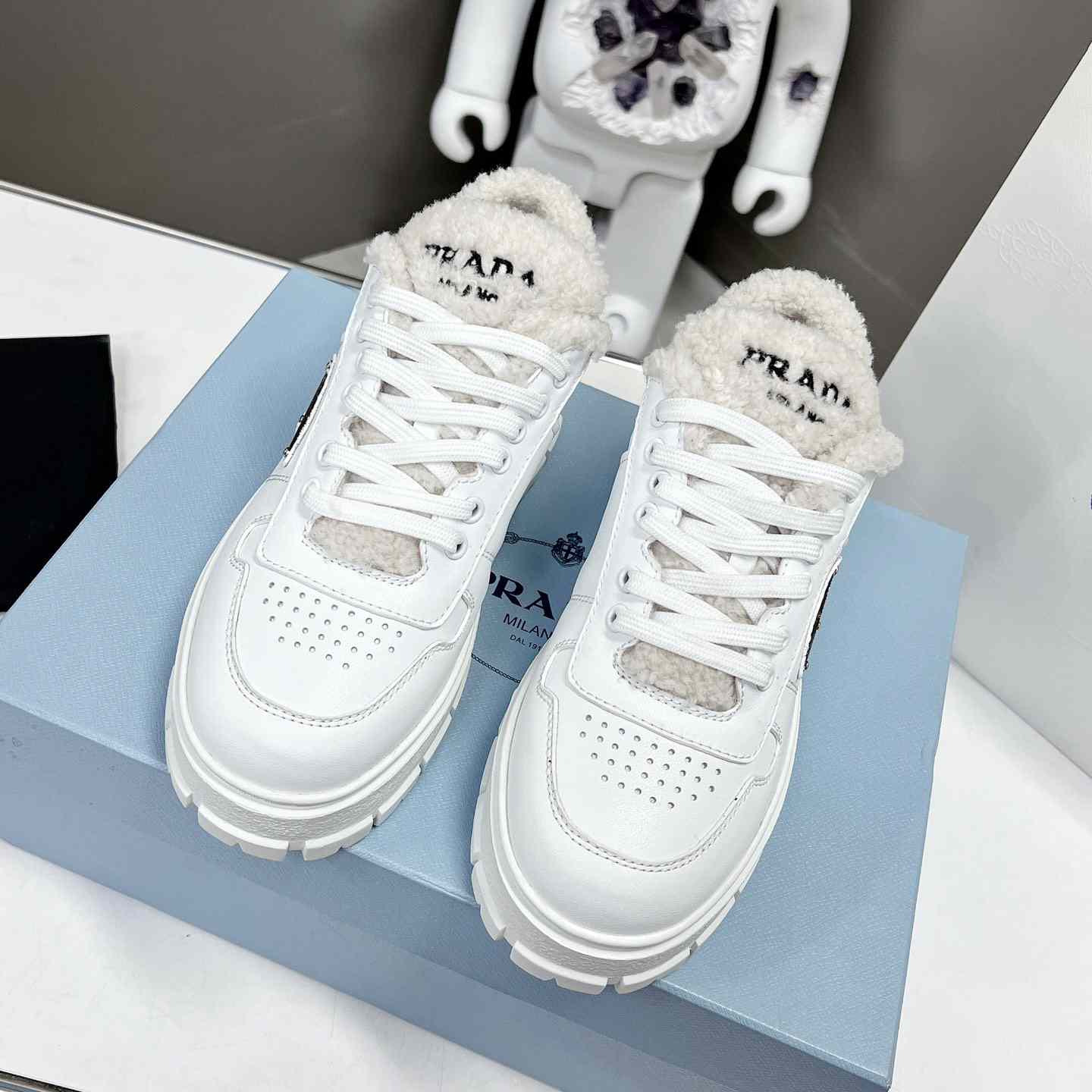 Prada Leather And Shearling Sneakers - EUR FASHION