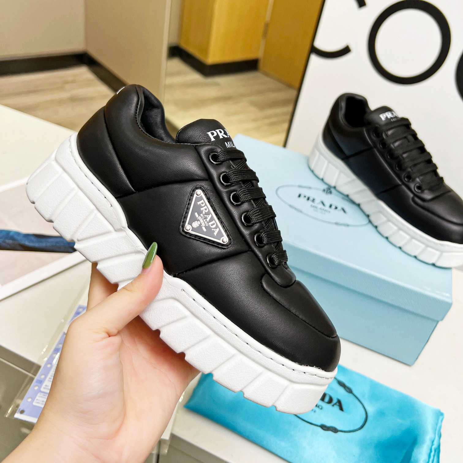 Prada Padded Nappa Leather Sneakers - EUR FASHION
